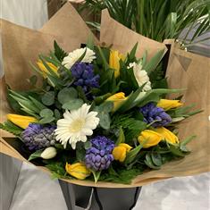 Spring tulip and hyacinth hand tied